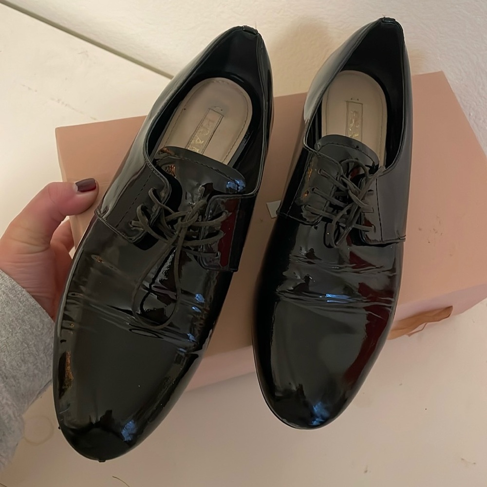 Prada Black patent leather loafers sz 39, scuffed toes